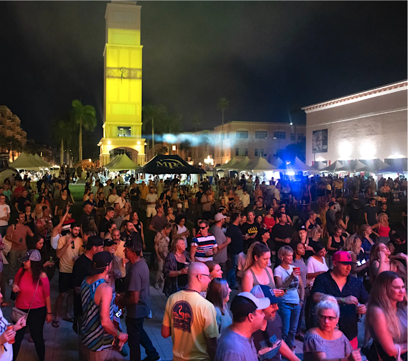 The Tequila Festival · night crowd at Mizner Park